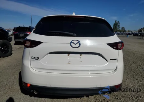 2021 Mazda Cx-5 Touring z USA, uszkodzony, nr VIN JM3KFBCM0M1447310